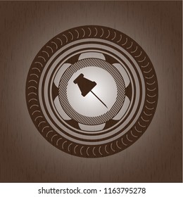 paper pin icon inside retro style wood emblem