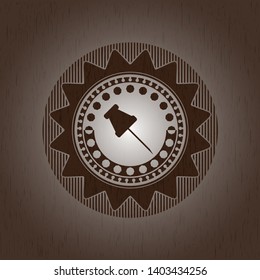paper pin icon inside retro style wooden emblem
