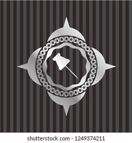 paper pin icon inside silvery badge