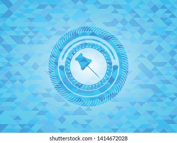 paper pin icon inside sky blue mosaic emblem