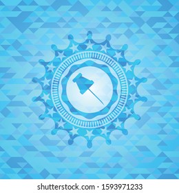 paper pin icon inside sky blue mosaic emblem