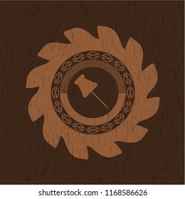 paper pin icon inside wooden emblem. Retro