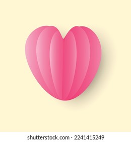Paper pink heart on pink background, symbol of Love. 
