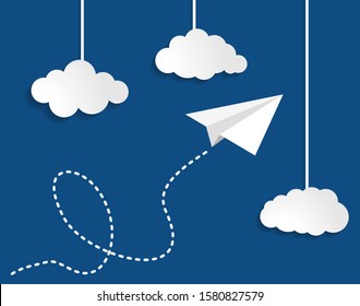 paper plane with clouds on Classic Blue color of the year 2020 background