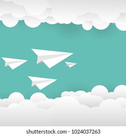 Paper plane flying with clouds and space flat design paper cut background