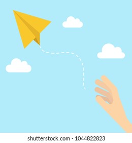 paper plane and hand on sky. freedom concept.