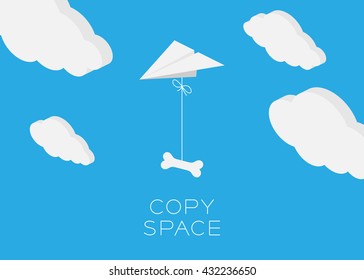 Paper plane hanging bone flying in the blue sky and cloud background with copy space, postcard size 5x7 inches