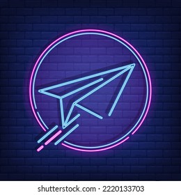 Paper plane neon sign on brick wall. Blue bright paper plane in circle. Night bright advertisement. Vector illustration in neon style for travel and vacation.