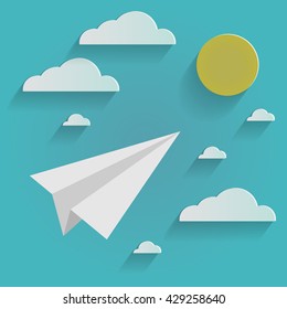 Paper plane on blue sky with clouds. The goal consept.