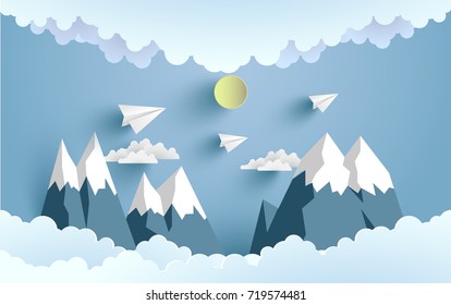 paper planes cross mountains and clouds with beautiful scenery