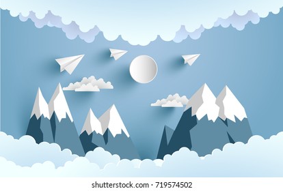 paper planes cross mountains and clouds with beautiful scenery
