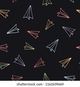Paper planes seamless sketchy pattern. Origami hand-drawn planes flying in different destinations on blackboard background. Doodle style illustration doodled by colorful chalks. 
