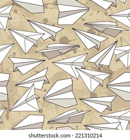 Paper planes seamless texture. Vector illustration. Grunge background with drops and splashes