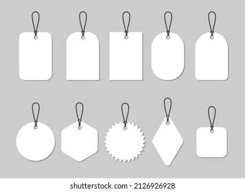 Paper price tags or labels of various shapes. Gift tags with blank white background. Designer sticker. Place for prices and discounts. Set of icons isolated on a gray background. Vector.