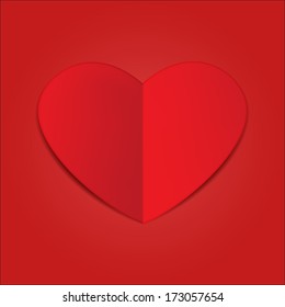 Paper red heart Valentines day shape on red background.