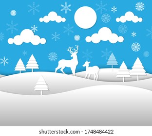 Paper of reindeer and deer graze in the fields of the forest. In the snowy winter, which is during Christmas day make the tree white.