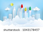 paper rockets flying across town. startup business concept. design paper art and crafts