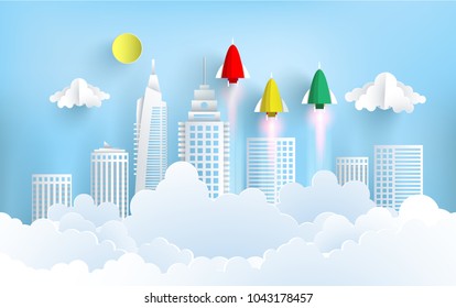 paper rockets flying across town. startup business concept. design paper art and crafts