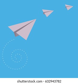 Paper Rockets on Blue Background