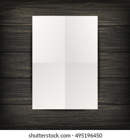 Paper sheet on wood background. Vector EPS10 illustration.