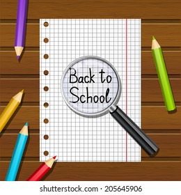 Paper sheet with pencils and magnifier