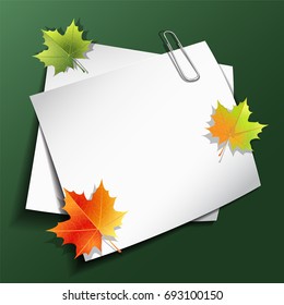 Paper sheets with paper clip and maple autumn leaves on green background. Vector illustration eps 10.