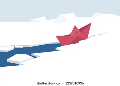 Paper ship sailing through arctic ice
