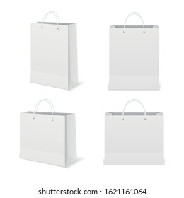 Paper shopping bags collection. Empty cardboard packet on white background.
