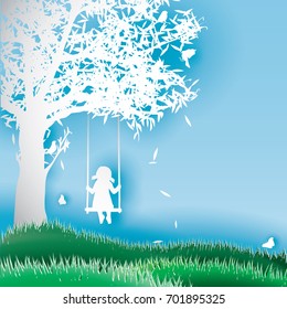 Paper silhouette of girl on swing