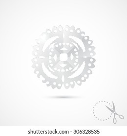 Paper snowflake on grey background. 3D Paper folding texture. Handmade, paper cut with scissors. Old style hobby preparation for New year and Christmas Holidays.