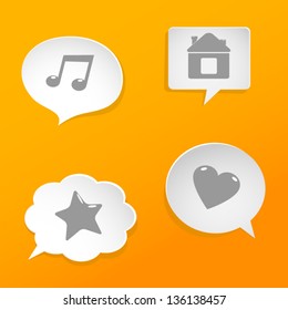 Paper speech bubbles with social media signs.