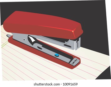 a paper stapler on top of a paper	
