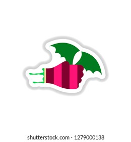 paper sticker on background of hand bat