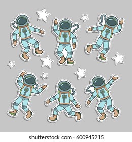 Paper stickers of astronauts. Vector set of cosmonaut and stars.