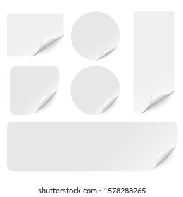 Paper stickers with curled corners on white background. Vector