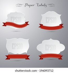 Paper stickers with red ribbons