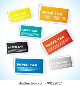 Paper tags with white borders and sticky tape