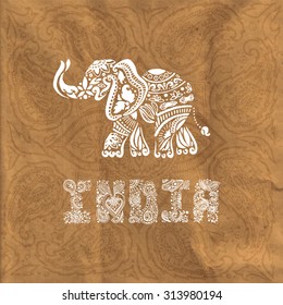 Paper texture background. Traditional Indian style. Doodle. Stylized elephant. Lettering. The image can be used as a template, background, wallpaper, textile printing, printing on cards