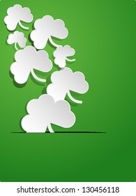Paper texture shamrock on green background