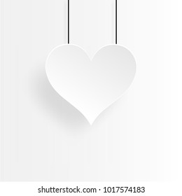 Paper white heart and white background, Valentine's day.