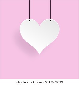 Paper white heart and pink background, Valentine's day.