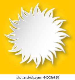 Paper white shining sun on the yellow sky.