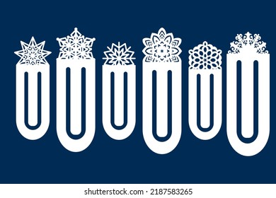 Paperclip bookmarks with cut-out snowflake decoration. Laser cutting. Paper cut