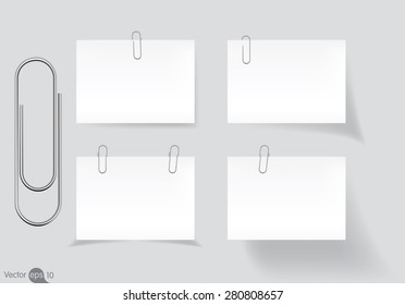 Paperclip holding a blank paper sheet