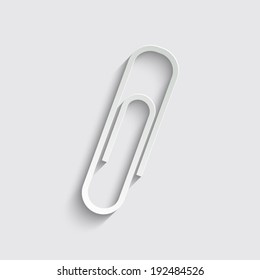  paperclip icon with shadow on a grey background