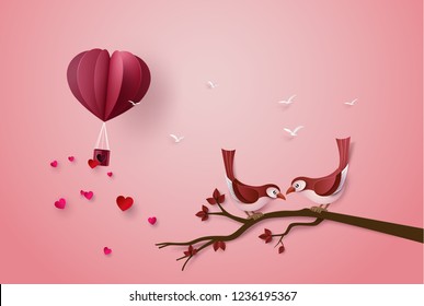 papercut with love Birds perched on a branch of a tree. illustration of Valentine day