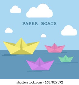 Papers boats on the sea