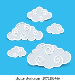 Papers Swirl Chinese Clouds Isolated on Blue Background. Cute Illustration for Decorating Sky, Weather Forecast. Sketch Template in Cartoon Outline Style. Kids cartoon style.