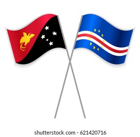 Papuan and Cabo Verdean crossed flags. Papua New Guinea combined with Cabo Verde isolated on white. Language learning, international business or travel concept.