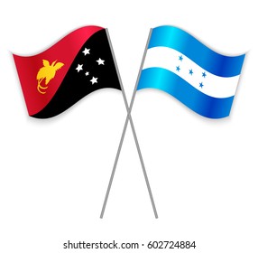 Papuan and Honduran crossed flags. Papua New Guinea combined with Honduras isolated on white. Language learning, international business or travel concept.